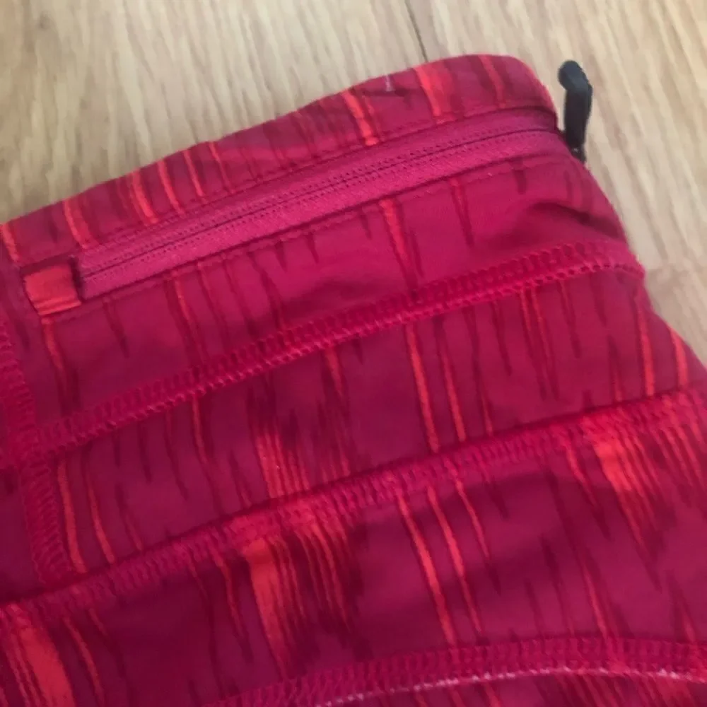LOLE Pink Mesh Back Zipped Pocket Capri Leggings